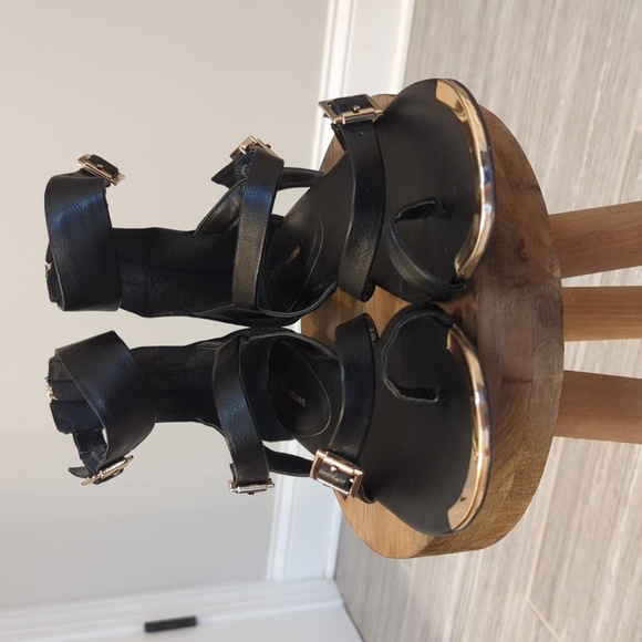 BCBG Generation Black Leather and Gold Gladiator Sandals - Picture 2 of 7